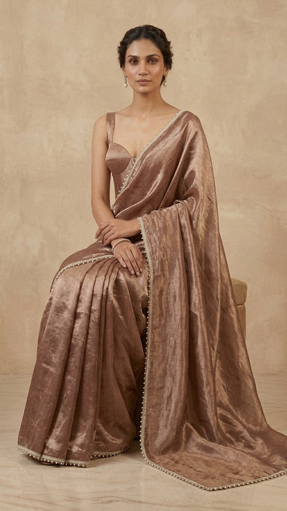 Mesmeric Brown Tissue Silk Saree with Pearl Detailing & Blouse Fabric